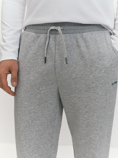 Брюки из хлопкового трикотажа с брендированным принтом