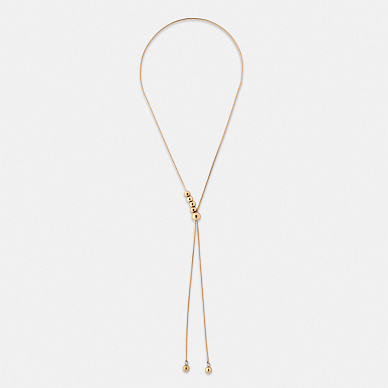 Золотистое колье-галстук