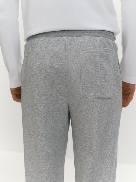 Брюки из хлопкового трикотажа с брендированным принтом