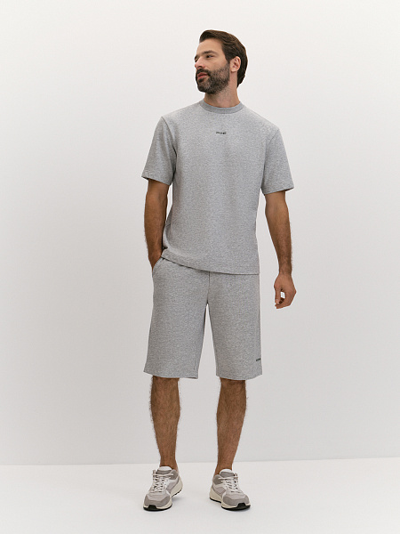 Шорты из хлопкового трикотажа с брендированным принтом